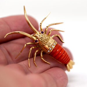 Vintage 18K Gold Lobster Brooch with Carved Coral, Diamonds, and Ruby Eyes
